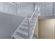 Bright white staircase with painted balusters and handrail provides access to upper level at 5295 Old Trail Cir, Stone Mountain, GA 30088