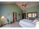 Spacious bedroom offers a tranquil retreat with vaulted ceiling and mirrored closet at 118 Heritage Way, Peachtree City, GA 30269