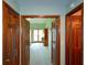 Entryway with detailed woodwork showcasing access to multiple rooms at 118 Heritage Way, Peachtree City, GA 30269