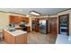 Large kitchen featuring light countertops, ample cabinet space, stainless appliances, and pantry at 118 Heritage Way, Peachtree City, GA 30269