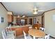 Spacious kitchen with wood cabinets, stainless steel appliances, and an adjoining dining area at 118 Heritage Way, Peachtree City, GA 30269