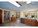 Spacious kitchen featuring wood cabinets, laminate countertops, stainless appliances and tile floors at 118 Heritage Way, Peachtree City, GA 30269