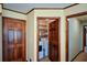 Well-organized laundry room with a folding shelf, washer, and dryer at 118 Heritage Way, Peachtree City, GA 30269