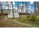 Yard with storage shed and stone pathway at 118 Heritage Way, Peachtree City, GA 30269