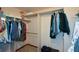 Spacious walk-in closet offers ample storage with shelving and hanging rods for organized clothing and accessories at 118 Heritage Way, Peachtree City, GA 30269