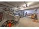 Unfinished basement area features gym equipment and ample storage; ready for customization at 1460 Parkmont Dr, Roswell, GA 30076