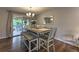 Dining space leading to outdoor deck with a sliding glass door, perfect for indoor/outdoor living at 1460 Parkmont Dr, Roswell, GA 30076