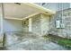 Carport with stone siding, offering covered parking and protection from the elements at 2162 Brookview Nw Dr, Atlanta, GA 30318