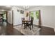 Cozy dining area featuring dark hardwood floors and natural light at 2162 Brookview Nw Dr, Atlanta, GA 30318