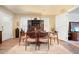 Charming dining room featuring a wooden table set, complemented by natural light from nearby windows at 2162 Brookview Nw Dr, Atlanta, GA 30318