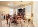 Inviting dining area featuring a modern table with seating for six, illuminated by soft, natural light at 2162 Brookview Nw Dr, Atlanta, GA 30318