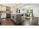 Modern kitchen with an island, stainless steel appliances, and stylish dining area at 2162 Brookview Nw Dr, Atlanta, GA 30318