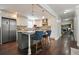 Elegant kitchen with white cabinets, stainless steel appliances and central island at 2162 Brookview Nw Dr, Atlanta, GA 30318