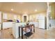 Bright kitchen featuring white cabinets, modern appliances, and a cozy eating area at 2162 Brookview Nw Dr, Atlanta, GA 30318