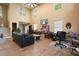 Open-concept living room with high ceilings, large windows, and contemporary furnishings at 2162 Brookview Nw Dr, Atlanta, GA 30318