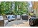 Spacious back deck with outdoor seating, grill, and views of the backyard at 3255 Sutcliffe Nw Rdg, Marietta, GA 30064