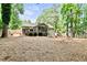 Expansive backyard with a large wooden deck, ideal for enjoying the outdoors and entertaining guests at 3255 Sutcliffe Nw Rdg, Marietta, GA 30064