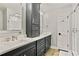 Modern bathroom boasts double vanity, sleek fixtures, and ample storage space at 3255 Sutcliffe Nw Rdg, Marietta, GA 30064