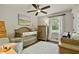 Cozy bedroom with natural light and neutral decor creates a serene atmosphere at 3255 Sutcliffe Nw Rdg, Marietta, GA 30064