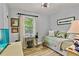 Inviting bedroom featuring a daybed and bright window with peaceful outdoor views at 3255 Sutcliffe Nw Rdg, Marietta, GA 30064