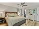 Spacious main bedroom with hardwood floors, a ceiling fan, and neutral-toned furnishings at 3255 Sutcliffe Nw Rdg, Marietta, GA 30064