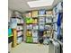 Organized storage room with shelving and plastic storage bins at 3255 Sutcliffe Nw Rdg, Marietta, GA 30064