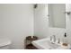 Clean bathroom featuring a pedestal sink, modern fixtures, and neutral wall colors at 1634 Ponce De Leon Ne Ave # 208, Atlanta, GA 30307