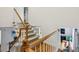Open staircase design with carpeted steps and a view of the living room below at 1634 Ponce De Leon Ne Ave # 208, Atlanta, GA 30307