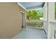 Welcoming front porch featuring wood door and white railing at 183 Whitefoord Ne Ave, Atlanta, GA 30307