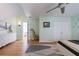 Bright bedroom featuring light walls, hardwood floors, and a ceiling fan at 2840 Alpine Rd, Atlanta, GA 30305