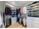 Well-organized walk-in closet with custom shelving, rods, and drawers for ample storage space at 2840 Alpine Rd, Atlanta, GA 30305