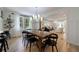 Open concept dining room with hardwood floors and large table at 2840 Alpine Rd, Atlanta, GA 30305