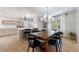 Dining area adjacent to kitchen with bright light and seating for eight at 2840 Alpine Rd, Atlanta, GA 30305