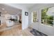 Welcoming entryway with hardwood floors and views to living room and outdoor deck at 2840 Alpine Rd, Atlanta, GA 30305