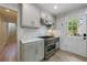 A well-equipped kitchen showcasing stainless steel appliances and natural light at 2840 Alpine Rd, Atlanta, GA 30305