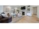 Spacious living room featuring hardwood floors, fireplace, and elegant decor at 2840 Alpine Rd, Atlanta, GA 30305