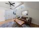 Bright bonus room with large windows, comfortable sofa and modern decor at 2840 Alpine Rd, Atlanta, GA 30305