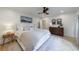 Spacious main bedroom features modern decor, hardwood floors, a ceiling fan, and plenty of natural light at 2840 Alpine Rd, Atlanta, GA 30305