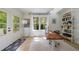 Bright home office with natural light, wood floors, and built-in shelving at 2840 Alpine Rd, Atlanta, GA 30305