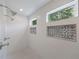 Luxurious shower with dual showerheads, decorative inlays, and a sleek, modern design at 2840 Alpine Rd, Atlanta, GA 30305