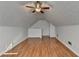 Finished attic featuring vaulted ceiling and wood-look flooring at 755 James Ridge Dr, Lawrenceville, GA 30045
