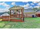 Picture of backyard with covered deck and outdoor seating perfect for relaxing and enjoying the outdoors at 755 James Ridge Dr, Lawrenceville, GA 30045
