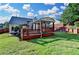 Well-maintained backyard with a covered deck, providing ample space for outdoor gatherings and relaxation at 755 James Ridge Dr, Lawrenceville, GA 30045