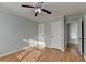 Bedroom featuring a ceiling fan, and two closets at 755 James Ridge Dr, Lawrenceville, GA 30045