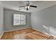 Bedroom featuring a window and ceiling fan at 755 James Ridge Dr, Lawrenceville, GA 30045