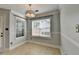 Charming breakfast area with natural light from two windows at 755 James Ridge Dr, Lawrenceville, GA 30045