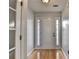 Bright foyer featuring hardwood floors, neutral paint and a front door with sidelights at 755 James Ridge Dr, Lawrenceville, GA 30045
