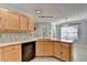 Kitchen with stainless appliances and wood cabinets at 755 James Ridge Dr, Lawrenceville, GA 30045