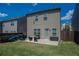Backyard featuring a patio, grill, and fenced yard, perfect for outdoor living at 109 Auburn Crossing Dr, Auburn, GA 30011