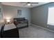 Cozy Bedroom with a grey crib, changing table, and soothing neutral colors; perfect for a new baby at 109 Auburn Crossing Dr, Auburn, GA 30011